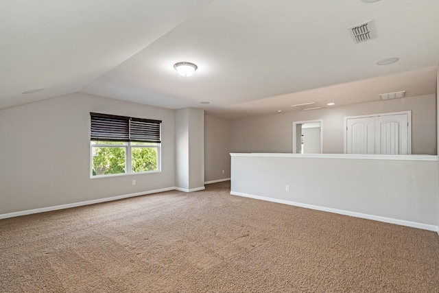 2303 Dewey Dr, Spring Hill, TN 37174 - spare room with carpet, baseboards, and lofted ceiling