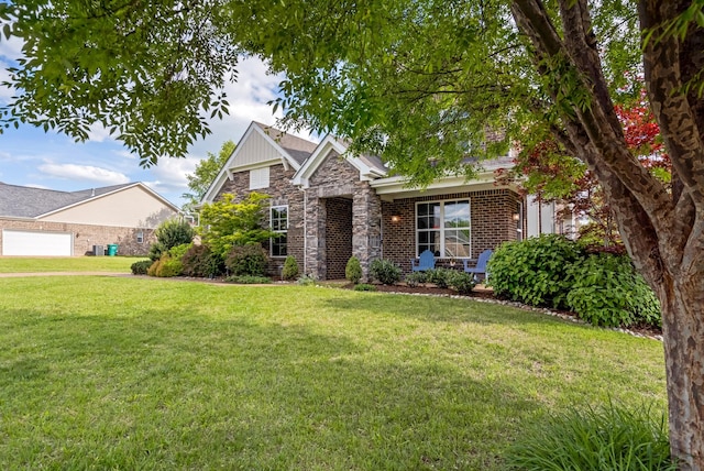 2303 Dewey Dr, Spring Hill, TN 37174 - view of front facade with a front lawn and stone siding