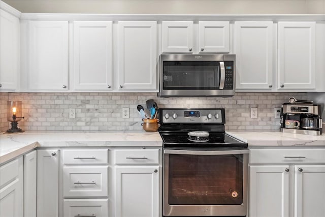 2025 Lewisburg Pike, Franklin, TN 37064 - kitchen featuring appliances with stainless steel finishes and white cabinets