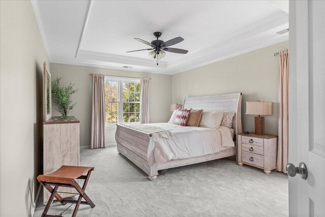 2025 Lewisburg Pike, Franklin, TN 37064 - bedroom featuring ornamental molding, a tray ceiling, light carpet, and ceiling fan