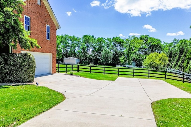 2025 Lewisburg Pike, Franklin, TN 37064 - view of patio with an attached garage and driveway