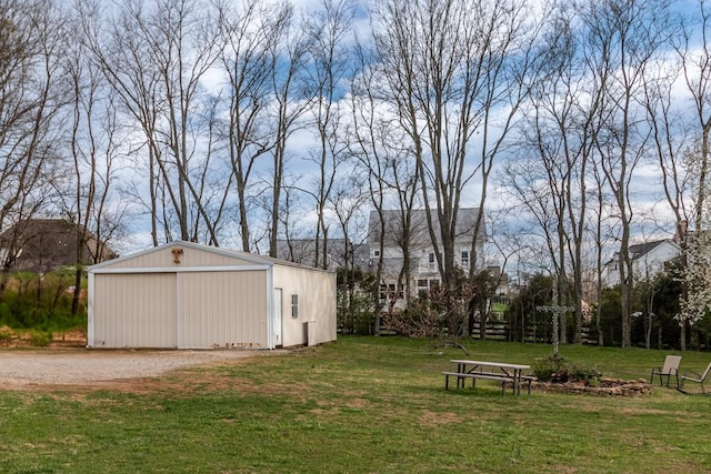 2025 Lewisburg Pike, Franklin, TN 37064 - view of grassy yard featuring an outbuilding, a garage, and an outdoor structure