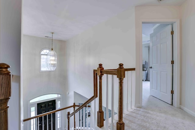 2025 Lewisburg Pike, Franklin, TN 37064 - corridor featuring a chandelier, carpet floors, an upstairs landing, and baseboards