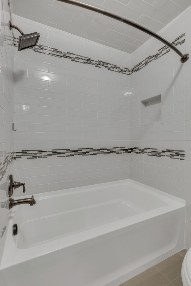 full bath with shower / bath combination and toilet