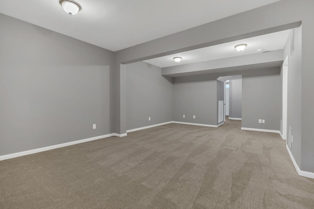 finished basement with carpet flooring and baseboards