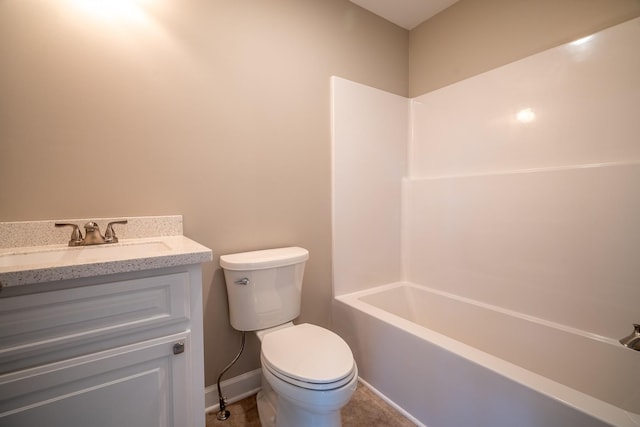 full bathroom featuring toilet, vanity, baseboards, and shower / bath combination