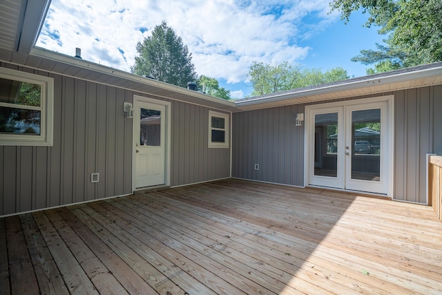 wooden deck featuring french doors