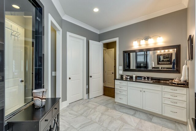 full bath with crown molding, recessed lighting, vanity, and marble finish floors