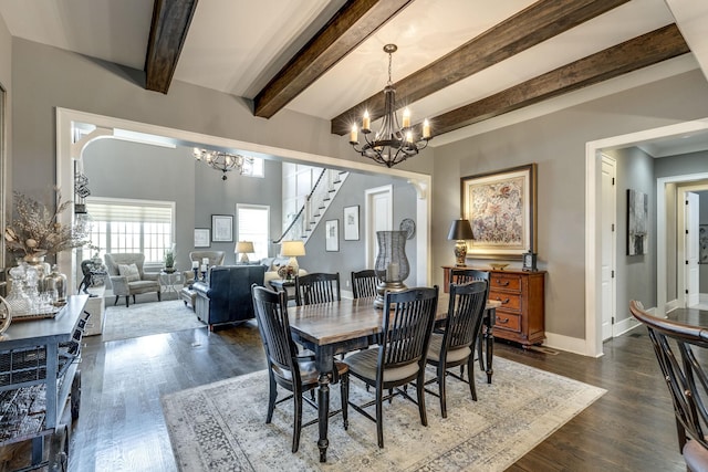 dining room featuring a chandelier, stairway, dark wood finished floors, beam ceiling, and baseboards