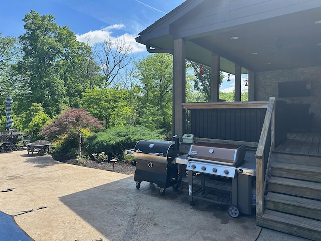 view of patio featuring a grill