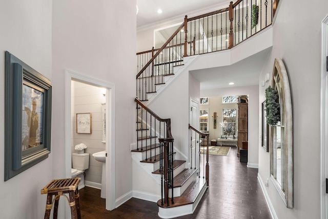 6752 Falls Ridge Ln, College Grove, TN 37046 - entrance foyer featuring a towering ceiling, baseboards, dark wood-type flooring, and stairway
