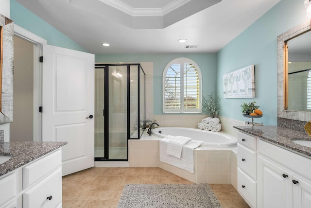 6752 Falls Ridge Ln, College Grove, TN 37046 - bathroom with a shower stall, a garden tub, two vanities, crown molding, and tile patterned flooring