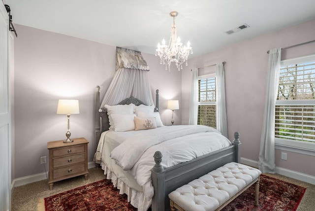 6752 Falls Ridge Ln, College Grove, TN 37046 - carpeted bedroom with a chandelier and baseboards