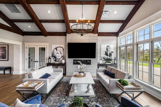 6752 Falls Ridge Ln, College Grove, TN 37046 - living area with a chandelier, beam ceiling, wood finished floors, coffered ceiling, and baseboards