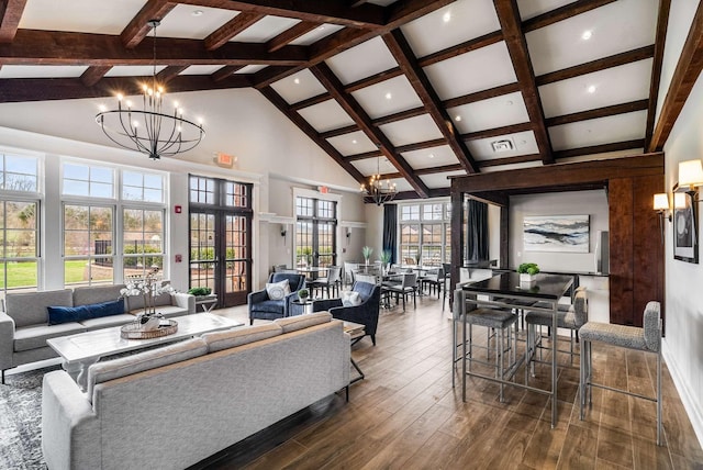 6752 Falls Ridge Ln, College Grove, TN 37046 - living area with a chandelier, high vaulted ceiling, beamed ceiling, and dark wood finished floors