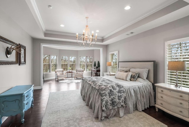 6752 Falls Ridge Ln, College Grove, TN 37046 - bedroom with a chandelier, ornamental molding, a tray ceiling, recessed lighting, and dark wood-style floors