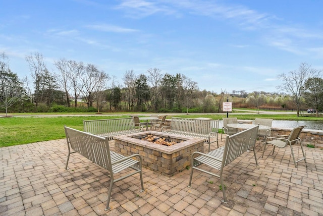 6752 Falls Ridge Ln, College Grove, TN 37046 - view of patio / terrace with an outdoor fire pit
