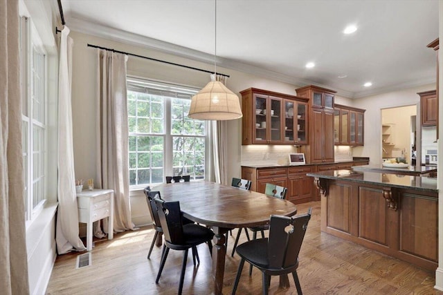 2507 Eagle Creek Way, Signal Mountain, TN 37377 - dining space with crown molding, light wood-style flooring, and recessed lighting