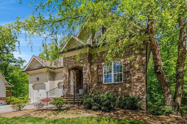 2507 Eagle Creek Way, Signal Mountain, TN 37377 - view of front of home featuring stone siding and driveway