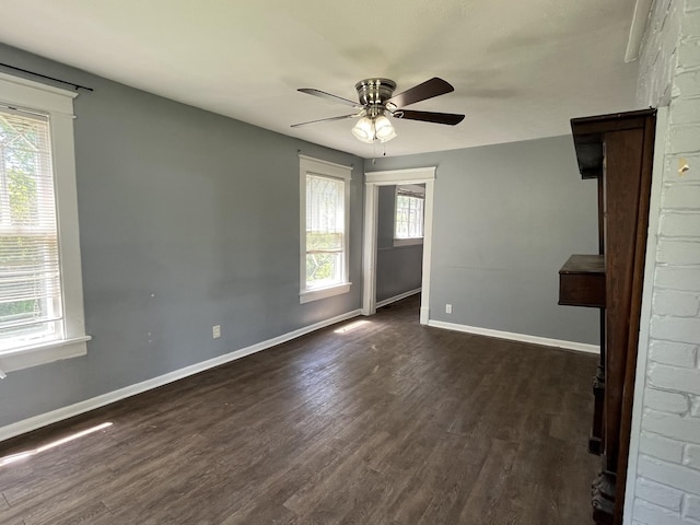 1538 Neelys Bend Rd, Madison, TN 37115 - spare room with ceiling fan, dark wood-style floors, and baseboards