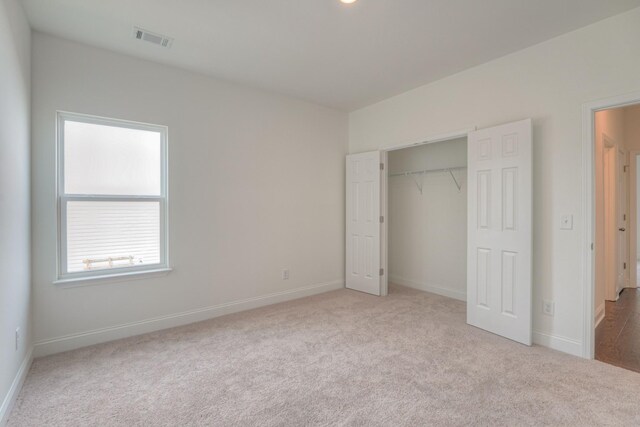 1765 Triple Crown Cir, Gallatin, TN 37066 - unfurnished bedroom featuring carpet flooring, multiple windows, and baseboards