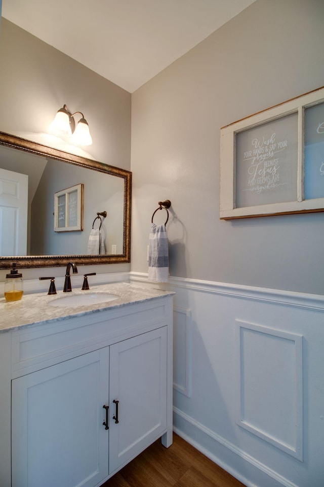 1334 Davy Crockett Dr, Murfreesboro, TN 37129 - bathroom featuring wainscoting, vanity, wood finished floors, and a decorative wall