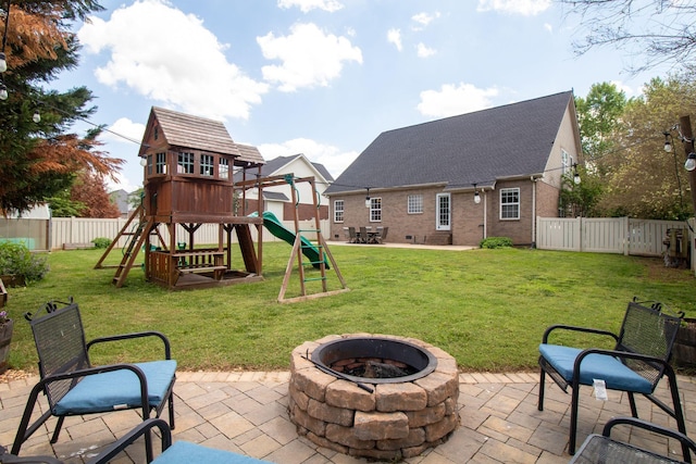 1334 Davy Crockett Dr, Murfreesboro, TN 37129 - view of play area featuring a fire pit and a patio