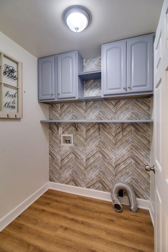 1334 Davy Crockett Dr, Murfreesboro, TN 37129 - washroom with cabinet space, wood finished floors, hookup for a washing machine, and baseboards