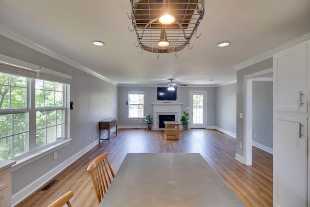 1334 Davy Crockett Dr, Murfreesboro, TN 37129 - unfurnished living room with wood finished floors, a ceiling fan, a fireplace, baseboards, and ornamental molding