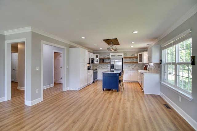 1334 Davy Crockett Dr, Murfreesboro, TN 37129 - kitchen featuring stainless steel appliances, open shelves, plenty of natural light, tasteful backsplash, and recessed lighting