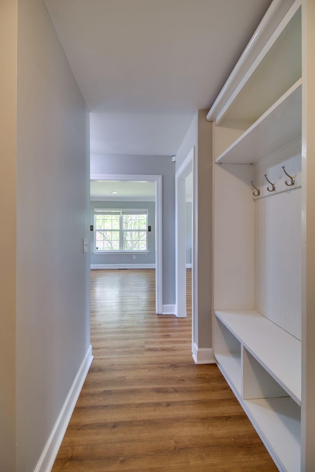 1334 Davy Crockett Dr, Murfreesboro, TN 37129 - mudroom featuring baseboards and wood finished floors