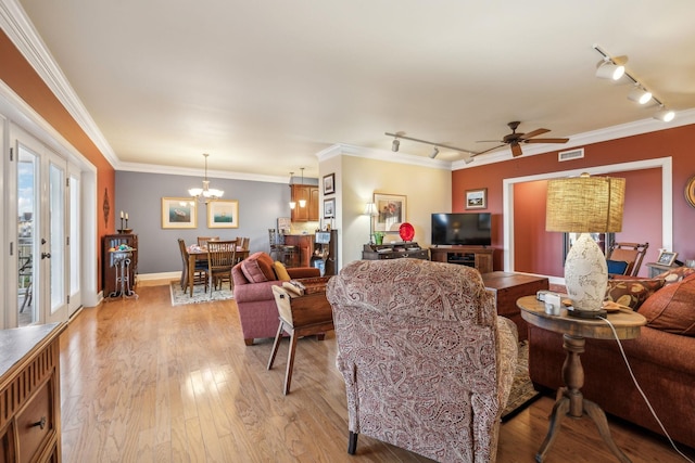 7100 Dale Ridge Rd Unit A4, Lancaster, TN 38569 - living room featuring track lighting, a chandelier, ornamental molding, light wood finished floors, and a ceiling fan