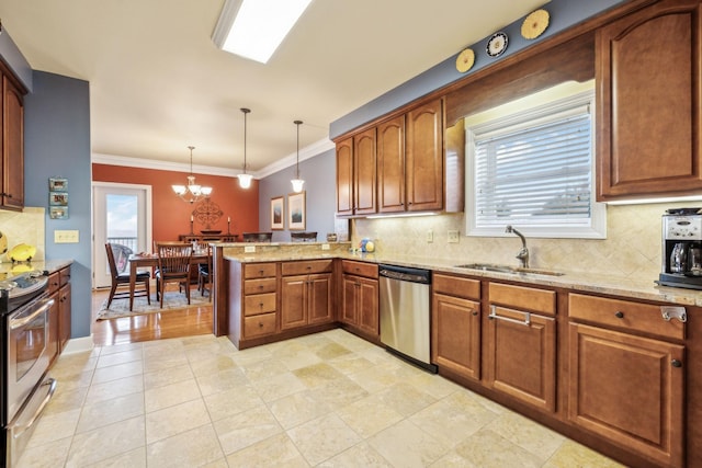 7100 Dale Ridge Rd Unit A4, Lancaster, TN 38569 - kitchen featuring stainless steel appliances, a sink, a peninsula, light stone countertops, and a chandelier
