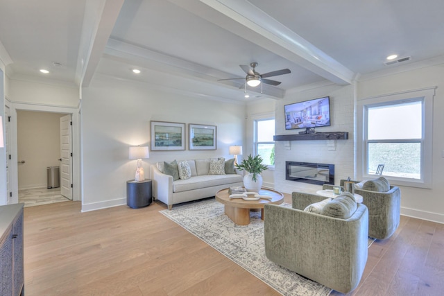 460 Triple Crown Cir, Gallatin, TN 37066 - living area featuring a large fireplace, beamed ceiling, wood finished floors, baseboards, and a ceiling fan