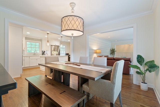 5175 Granny White Pike, Nashville, TN 37220 - dining area with ornamental molding, light wood finished floors, and baseboards