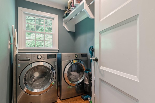 5175 Granny White Pike, Nashville, TN 37220 - washroom featuring separate washer and dryer, wood finished floors, and crown molding