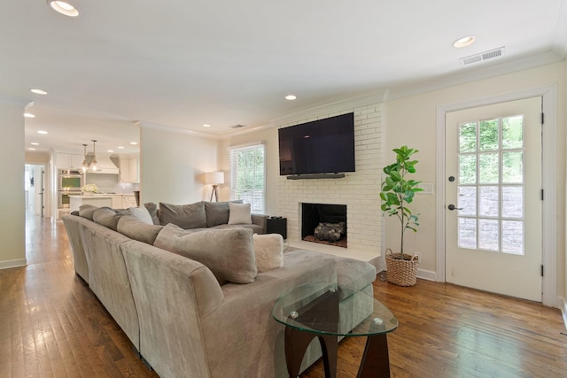 5175 Granny White Pike, Nashville, TN 37220 - living room with hardwood / wood-style floors, a brick fireplace, crown molding, recessed lighting, and baseboards