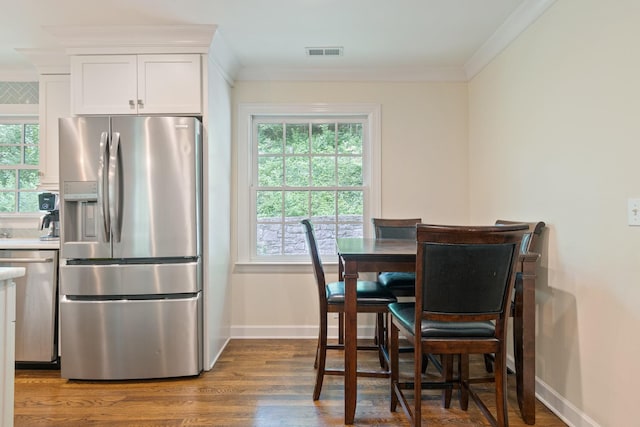 5175 Granny White Pike, Nashville, TN 37220 - dining room featuring wood finished floors, crown molding, and baseboards