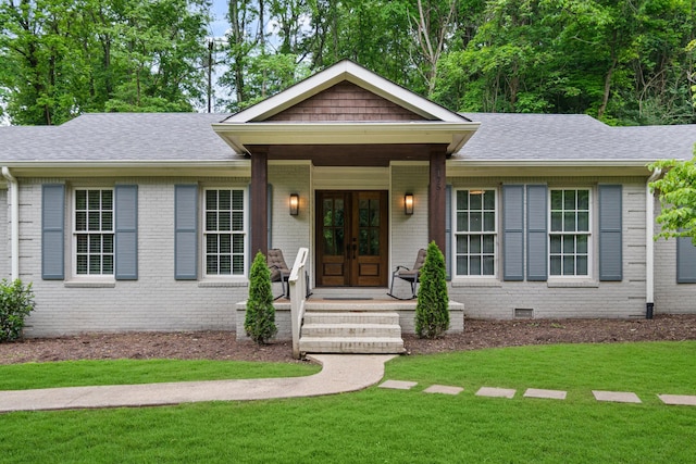 5175 Granny White Pike, Nashville, TN 37220 - view of front of property with french doors, a front lawn, brick siding, and roof with shingles