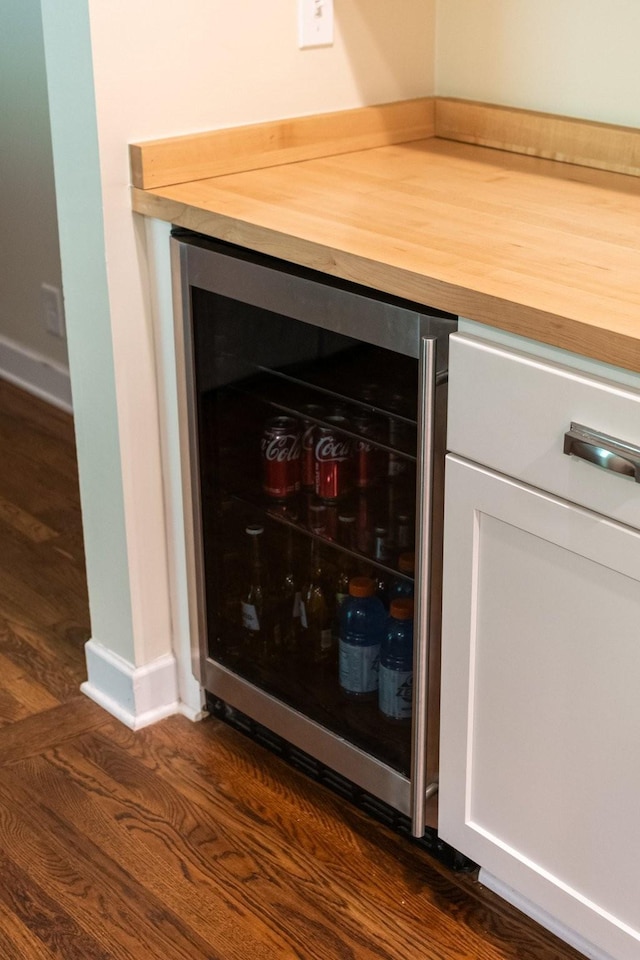 5175 Granny White Pike, Nashville, TN 37220 - detailed view of wine cooler, baseboards, and dark wood-style floors