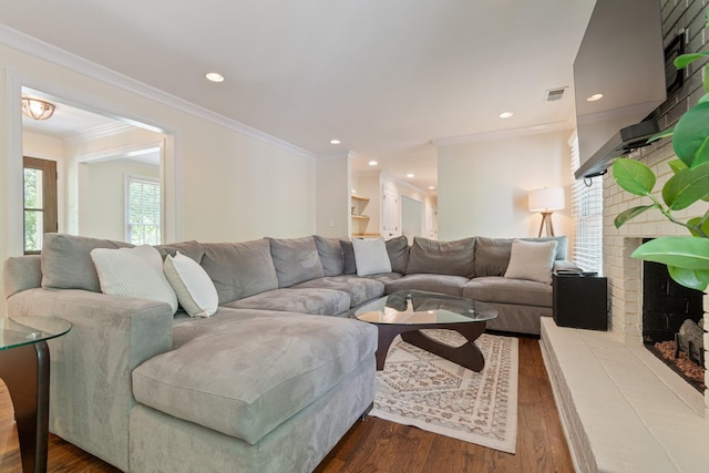 5175 Granny White Pike, Nashville, TN 37220 - living room with dark wood-style flooring, a fireplace, crown molding, and recessed lighting