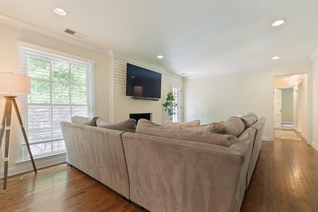 5175 Granny White Pike, Nashville, TN 37220 - living area with crown molding, a brick fireplace, healthy amount of natural light, dark wood finished floors, and recessed lighting