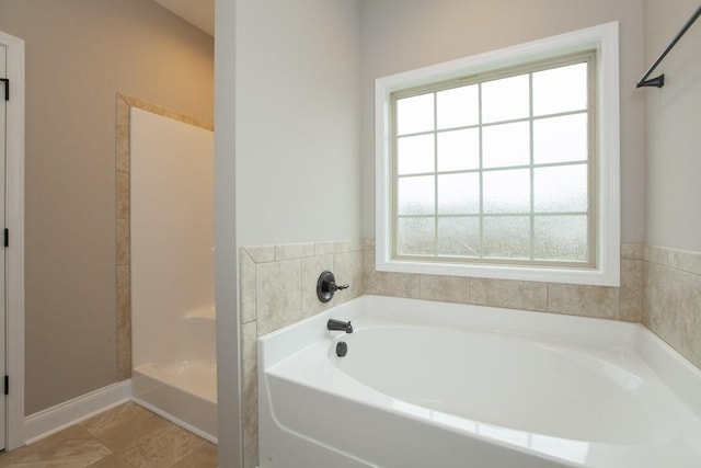 bathroom featuring a garden tub