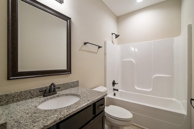 full bathroom with toilet, vanity, and shower / bathtub combination