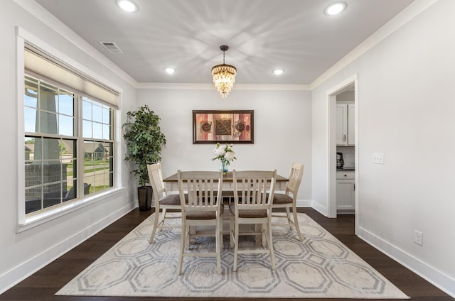 1149 Brixworth Dr, Spring Hill, TN 37174 - dining room featuring recessed lighting, a chandelier, crown molding, baseboards, and dark wood-style floors