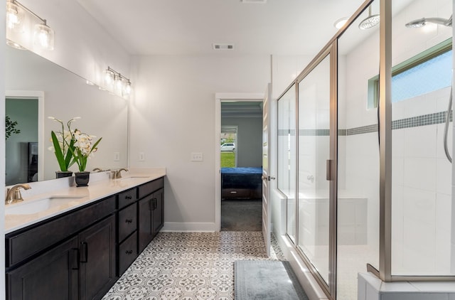 1149 Brixworth Dr, Spring Hill, TN 37174 - bathroom with ensuite bath, baseboards, a shower stall, and double vanity