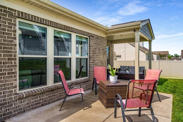 1149 Brixworth Dr, Spring Hill, TN 37174 - view of patio featuring fence and an outdoor living space