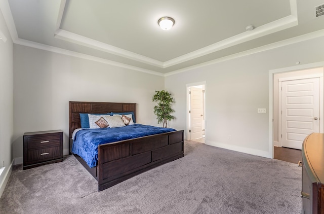1149 Brixworth Dr, Spring Hill, TN 37174 - carpeted bedroom featuring a tray ceiling, ornamental molding, and baseboards