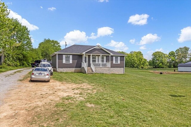 890 Akersville Rd, Lafayette, TN 37083 - view of front of property featuring a porch and a front lawn