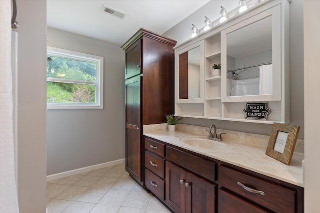 593 Gaulden Hollow Rd, Lafayette, TN 37083 - full bathroom with vanity, baseboards, and tile patterned floors